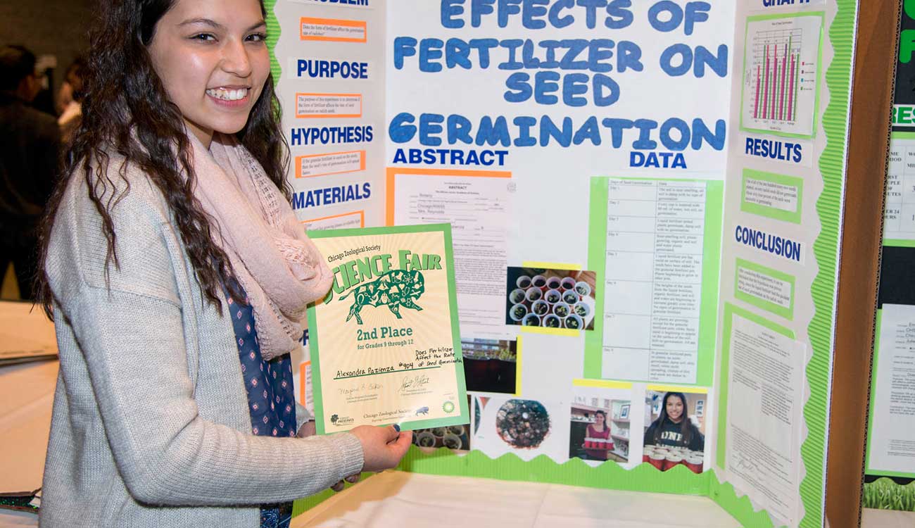 Young girl at science fair, Robin Andrews